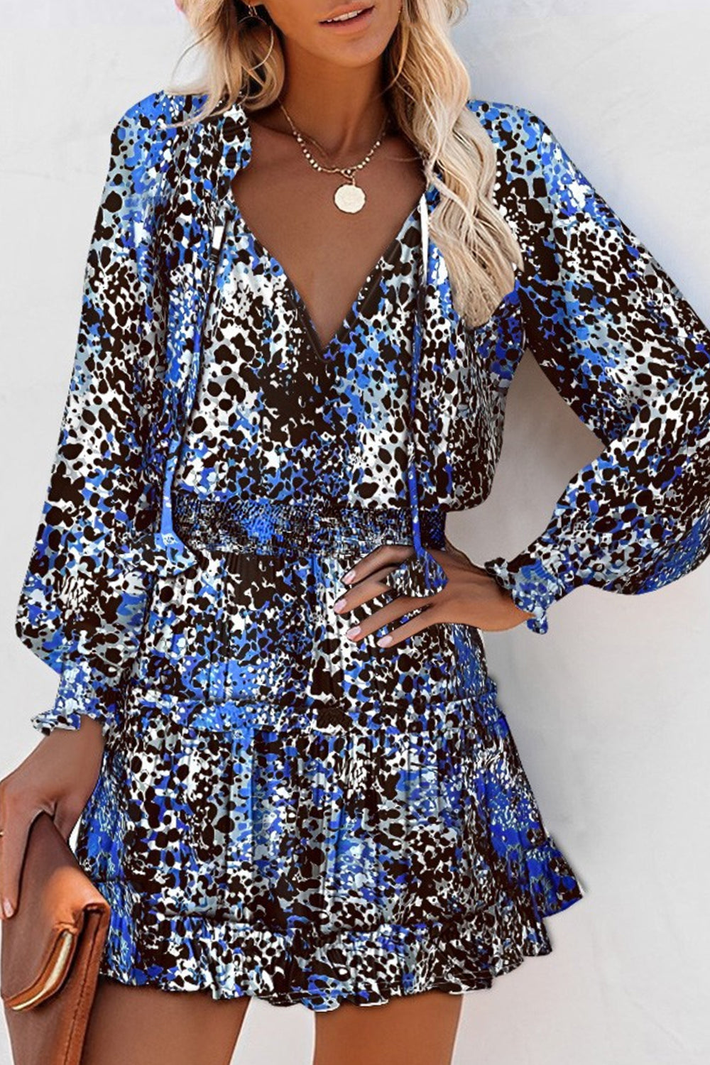 Dámské šaty s dlouhým rukávem v pase s výstřihem do V