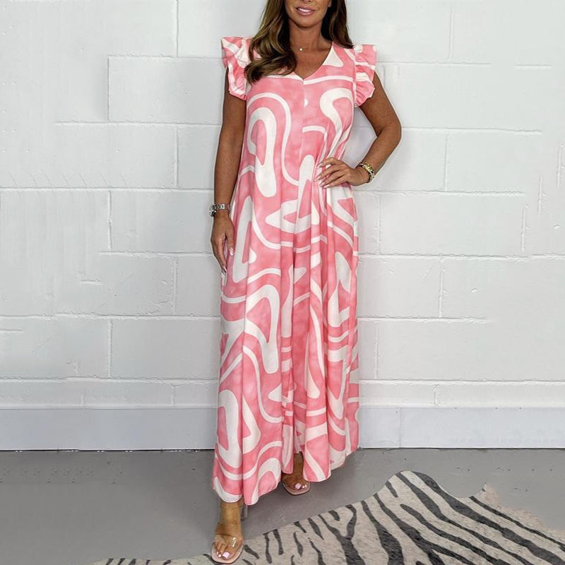 Dámská letní kombinéza se širokými nohavicemi s volánky a geometrickými potisky