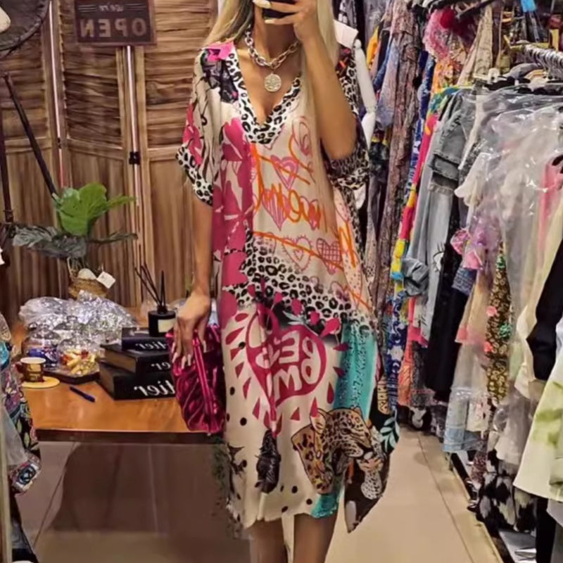 Dámské šaty s krátkým rukávem a hlubokým výstřihem do V