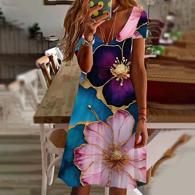 Elegantní dámské šaty s potiskem a výstřihem do V