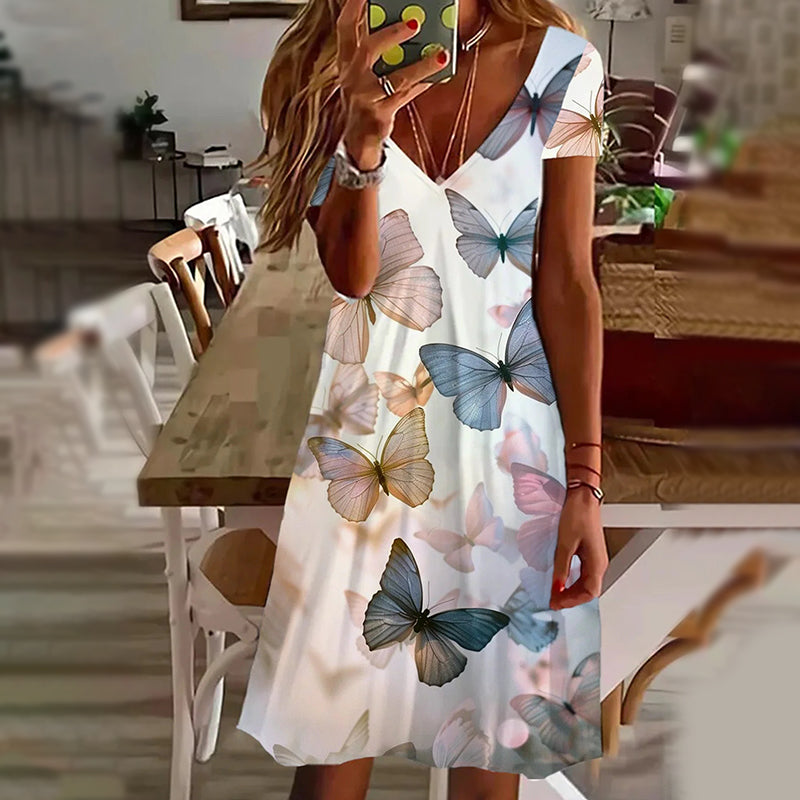 Elegantní dámské šaty s potiskem a výstřihem do V