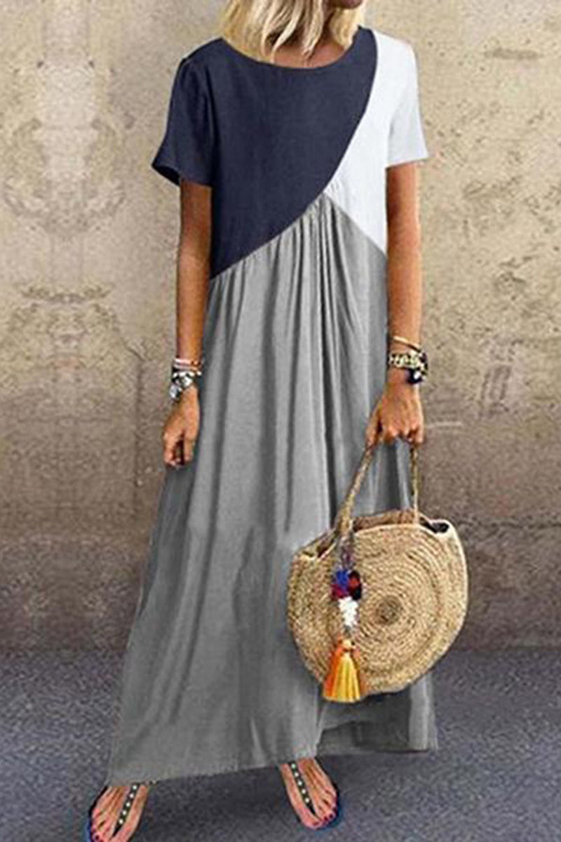 Dámské maxi šaty s nepravidelným krátkým rukávem v geometrickém barevném kontrastu